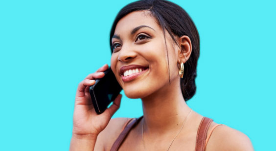 Woman talking on the phone while smiling