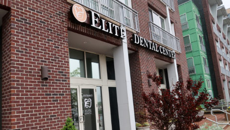 exterior view of elite dental brick building